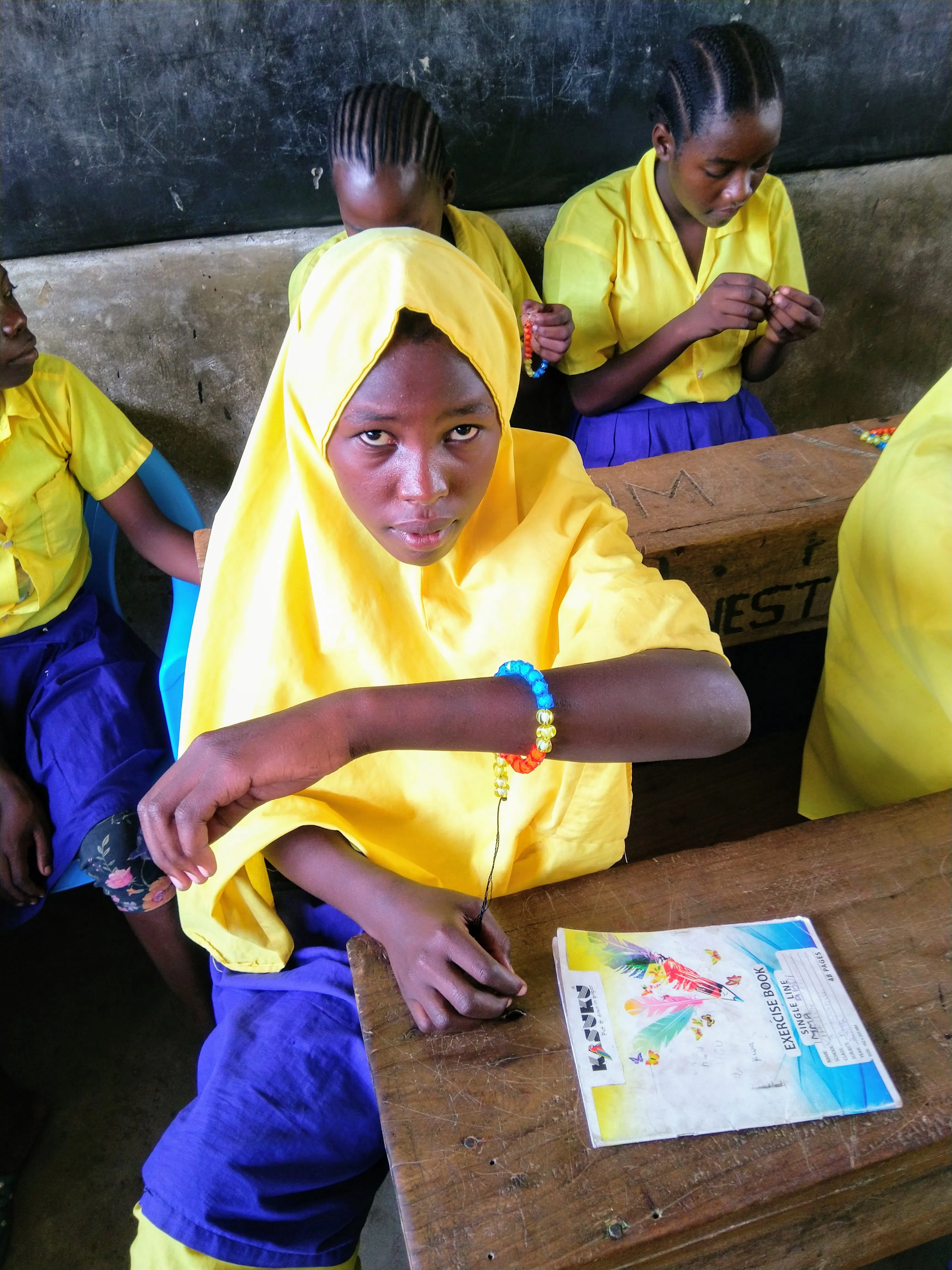 Image of a muslim kenyan girl wearing a menstrual bracelet